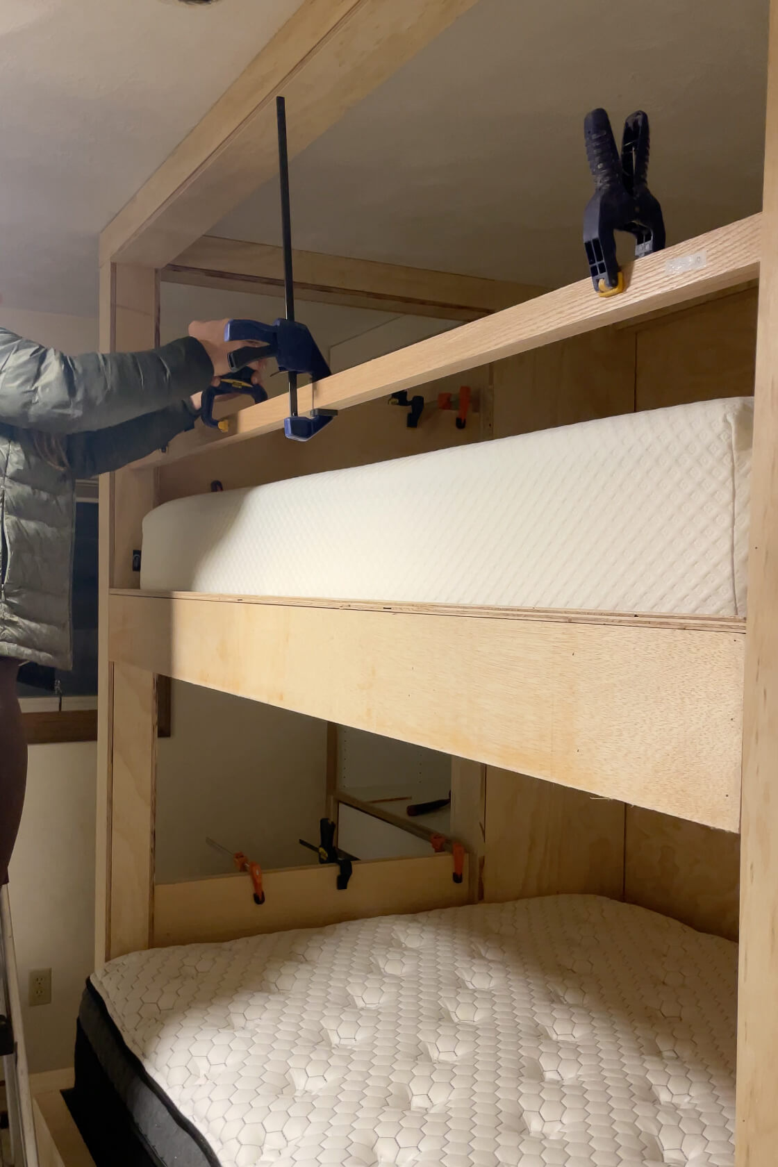 Adding safety railing to a DIY bunk bed.